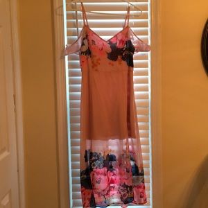 Blush dress with floral print.